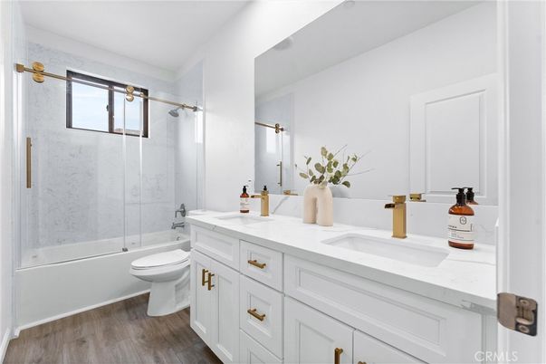 Bathroom, Dual Sink Vanities, Glass Shower, Interior, Wood Texture Flooring