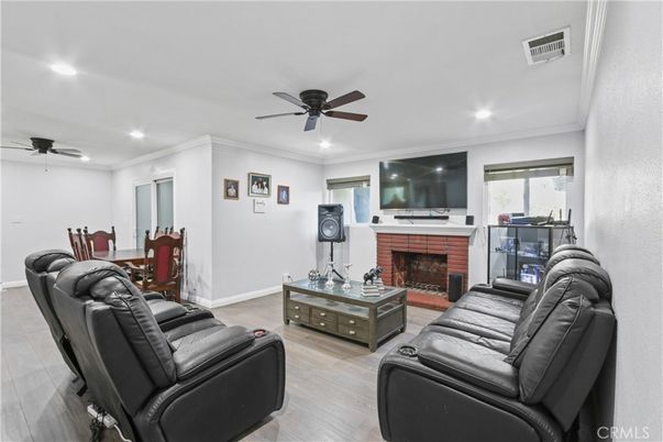 Home Theatre Room, Dining room, Fireplace, Interior, Living room, Recessed Lighting, Wood Texture Flooring