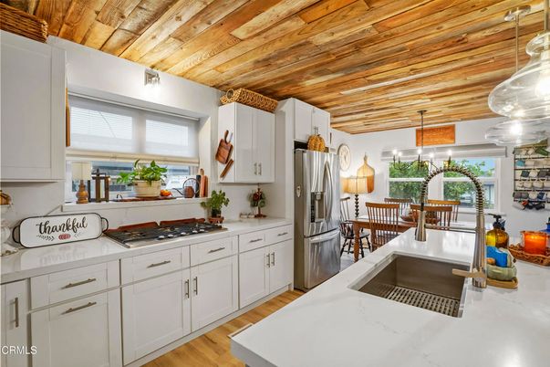 Dining room, Interior, Kitchen, Pendant Lights, Stainless Steel Appliances, Wooden Ceilings, Wood Texture Flooring
