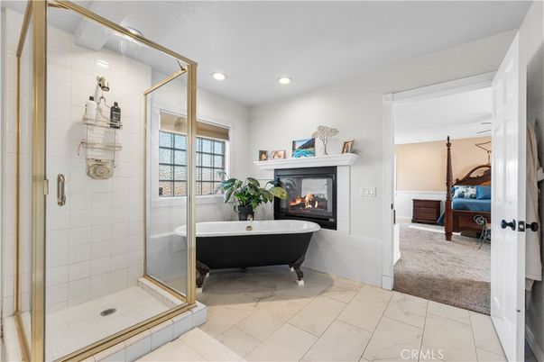 Bathroom, Fireplace, Free Standing Baths, Glass Shower, Interior, Marble, Recessed Lighting