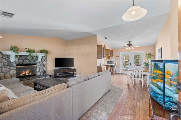 Dining room, Fireplace, Interior, Living room, Pendant Lights, Wood Texture Flooring