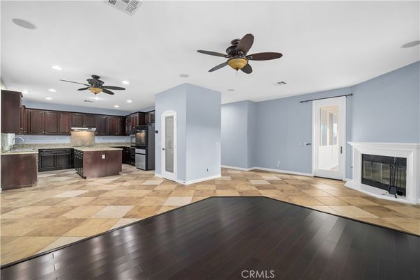 Fireplace, Interior, Kitchen, Recessed Lighting, Wood Texture Flooring