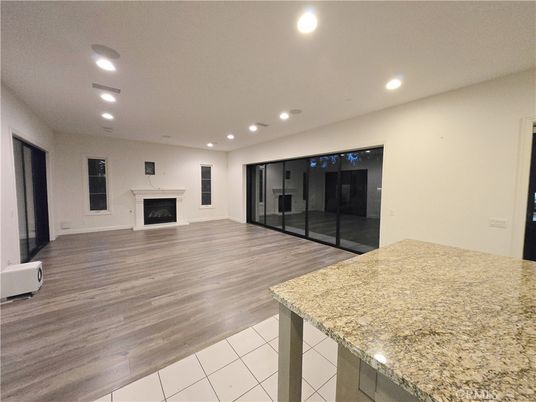 Empty room, Fireplace, Interior, Recessed Lighting, Wood Texture Flooring