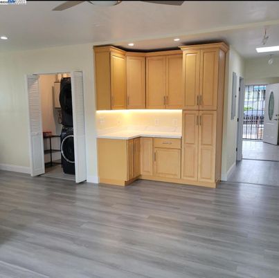 Interior, Kitchen, Recessed Lighting, Utility Closets, Washer, Wood Texture Flooring
