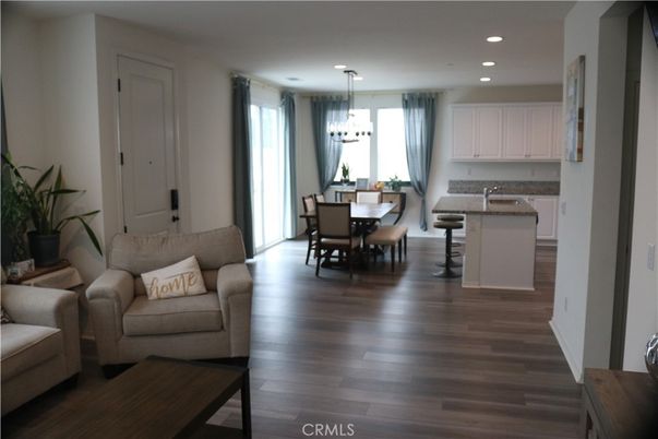 Chandelier, Dining room, Interior, Kitchen, Living room, Pendant Lights, Recessed Lighting, Wood Texture Flooring