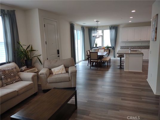 Chandelier, Dining room, Interior, Kitchen, Living room, Pendant Lights, Recessed Lighting, Wood Texture Flooring