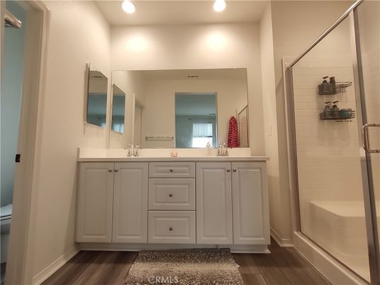 Bathroom, Dual Sink Vanities, Interior, Recessed Lighting, Wood Texture Flooring
