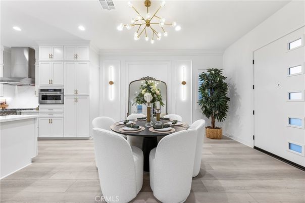Dining room, Interior, Kitchen, Pendant Lights, Recessed Lighting, Stainless Steel Appliances, Wood Texture Flooring