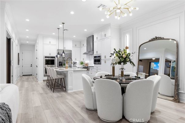 Dining room, Interior, Kitchen, Pendant Lights, Recessed Lighting, Stainless Steel Appliances, Wood Texture Flooring
