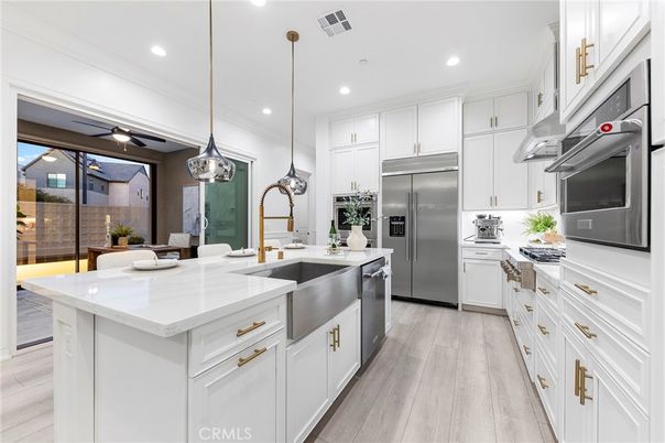 Interior, Kitchen, Pendant Lights, Recessed Lighting, Stainless Steel Appliances, Wood Texture Flooring