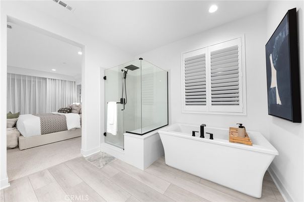 Bathroom, Bedroom, Free Standing Baths, Glass Shower, Interior, Recessed Lighting, Wood Texture Flooring