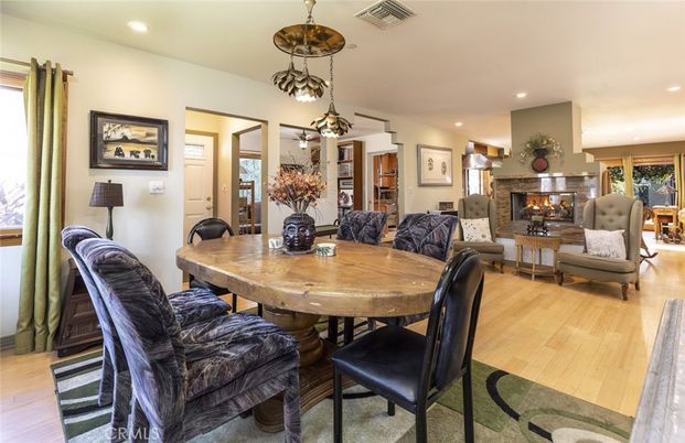 Dining room, Fireplace, Interior, Living room, Pendant Lights, Recessed Lighting, Wood Texture Flooring