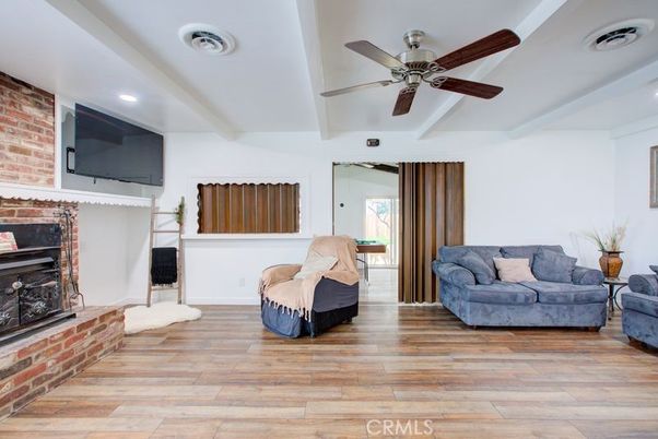 Fireplace, Interior, Recessed Lighting, Stone Walls, Wood Texture Flooring