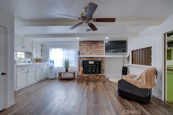 Fireplace, Interior, Recessed Lighting, Stone Walls, Wood Texture Flooring