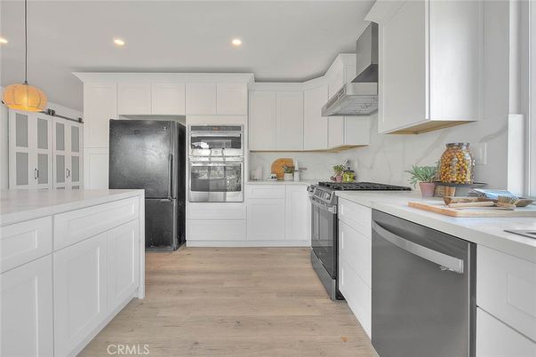 Interior, Kitchen, Pendant Lights, Recessed Lighting, Stainless Steel Appliances, Wood Texture Flooring