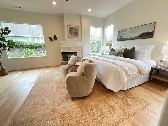 Bedroom, Fireplace, Interior, Recessed Lighting, Wood Texture Flooring