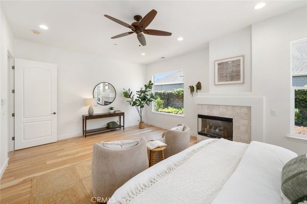 Bedroom, Fireplace, Interior, Recessed Lighting, Wood Texture Flooring