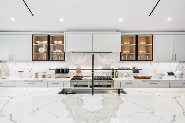 Interior, Kitchen, Marble Walls, Recessed Lighting, Stainless Steel Appliances