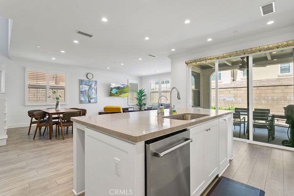 Dining room, Interior, Kitchen, Recessed Lighting, Stainless Steel Appliances, Wood Texture Flooring