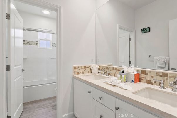 Bathroom, Dual Sink Vanities, Glass Shower, Interior, Wood Texture Flooring