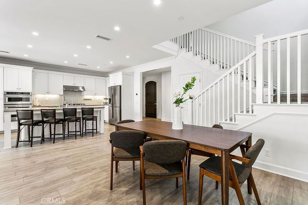 Dining room, Interior, Kitchen, Recessed Lighting, Stainless Steel Appliances, Wood Texture Flooring