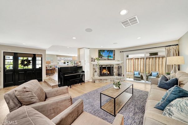 Fireplace, Interior, Living room, Piano, Recessed Lighting, Wood Texture Flooring