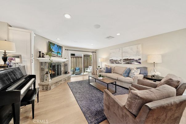 Fireplace, Interior, Living room, Piano, Recessed Lighting, Wood Texture Flooring