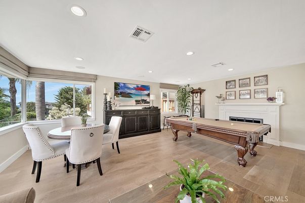 Billiard Table, Dining room, Fireplace, Game Room, Interior, Recessed Lighting, Wood Texture Flooring