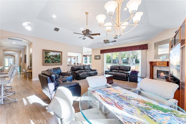 Chandelier, Fireplace, Interior, Living room, Recessed Lighting, Wood Texture Flooring
