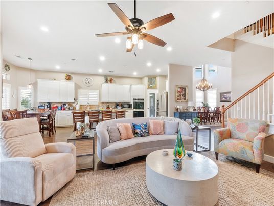 Chandelier, Dining room, Interior, Kitchen, Living room, Pendant Lights, Recessed Lighting, Stainless Steel Appliances, Wood Texture Flooring