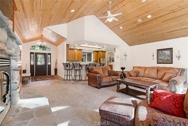 Chandelier, Fireplace, Interior, Kitchen, Living room, Recessed Lighting, Wooden Ceilings