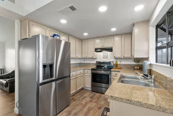 Interior, Kitchen, Recessed Lighting, Stainless Steel Appliances, Wood Texture Flooring