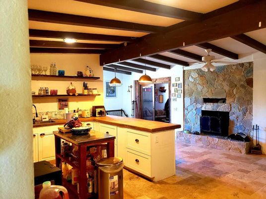 Fireplace, Interior, Kitchen, Pendant Lights, Recessed Lighting, Stone Walls, Wooden Beams