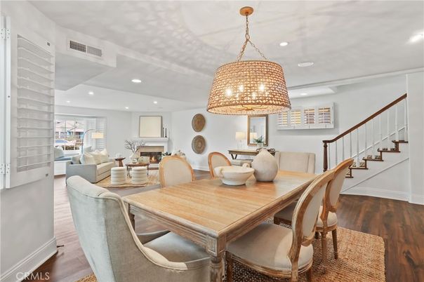 Dining room, Fireplace, Interior, Living room, Pendant Lights, Recessed Lighting, Wood Texture Flooring