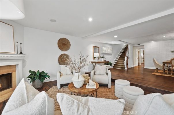 Dining room, Fireplace, Interior, Living room, Recessed Lighting, Wood Texture Flooring