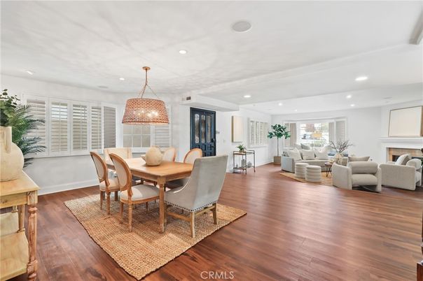 Dining room, Fireplace, Interior, Living room, Pendant Lights, Recessed Lighting, Wood Texture Flooring