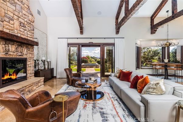 Dining room, Fireplace, Interior, Living room, Pendant Lights, Stone Walls, Wooden Beams, Wood Texture Flooring