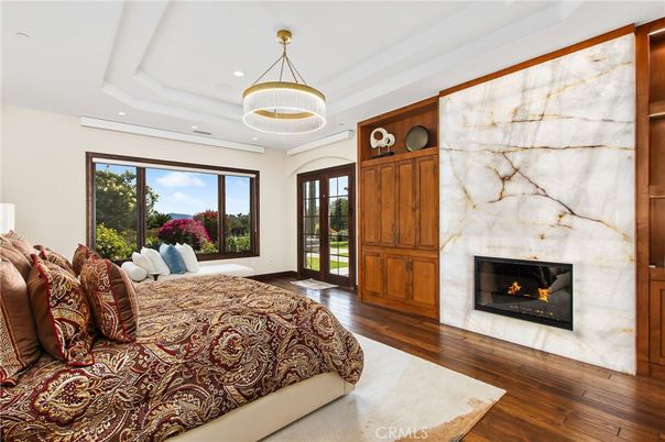 Bedroom, Fireplace, Interior, Pendant Lights, Recessed Lighting, Wood Texture Flooring