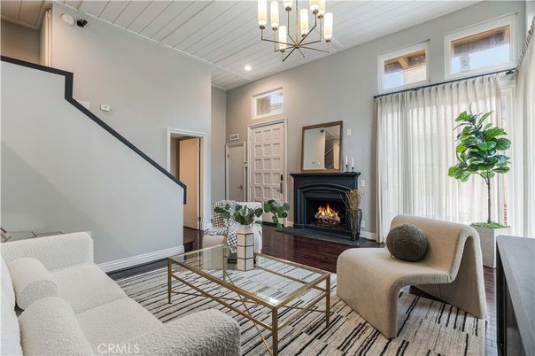 Chandelier, Fireplace, Interior, Living room, Recessed Lighting, Wood Texture Flooring