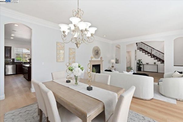 Chandelier, Dining room, Fireplace, Interior, Living room, Recessed Lighting, Wood Texture Flooring