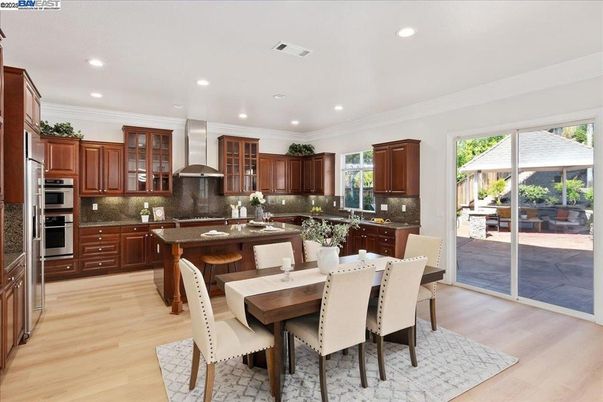 Dining room, Interior, Kitchen, Recessed Lighting, Stainless Steel Appliances, Wood Texture Flooring