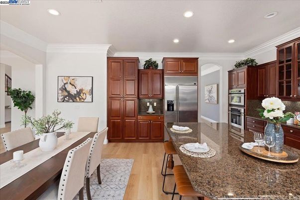 Dining room, Interior, Kitchen, Recessed Lighting, Stainless Steel Appliances, Wood Texture Flooring