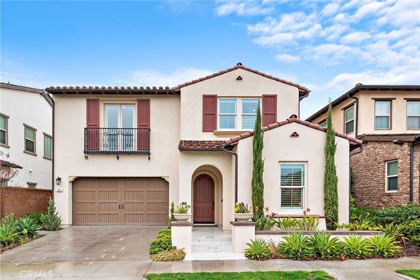 Attached, Exterior, Facade, Spanish Mediterranean