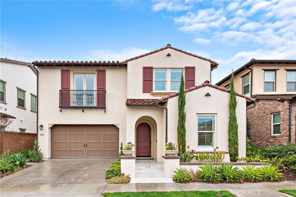 Attached, Exterior, Facade, Spanish Mediterranean