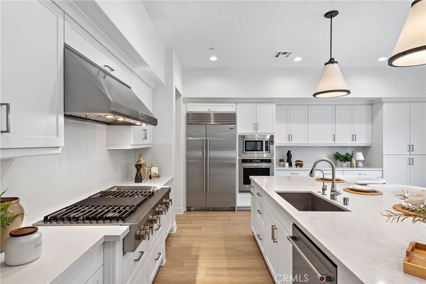 Interior, Kitchen, Pendant Lights, Recessed Lighting, Stainless Steel Appliances, Wood Texture Flooring