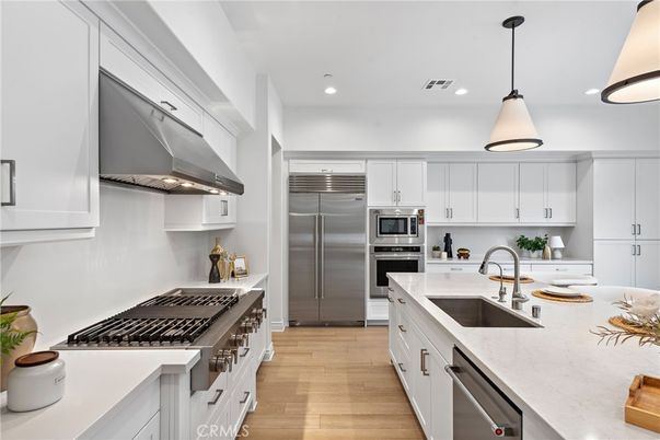 Interior, Kitchen, Pendant Lights, Recessed Lighting, Stainless Steel Appliances, Wood Texture Flooring