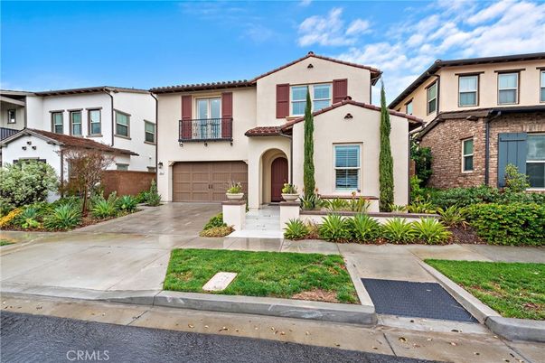 Attached, Exterior, Facade, Spanish Mediterranean