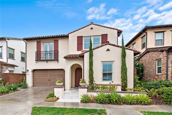 Attached, Exterior, Facade, Brick Facade, Spanish Mediterranean