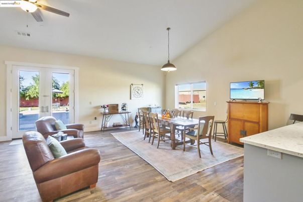Dining room, Interior, Living room, Pendant Lights, Wood Texture Flooring