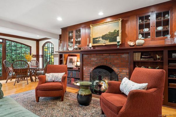 Dining room, Fireplace, Interior, Living room, Recessed Lighting, Stone Walls, Wood Texture Flooring